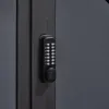 Fermeture avec porte à digicode de l'abri vélos Fermeture avec porte à digicode de l'abri vélos