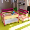 Aménagement de crèche avec meuble de rangement pour albums Aménagement de crèche avec meuble de rangement pour albums